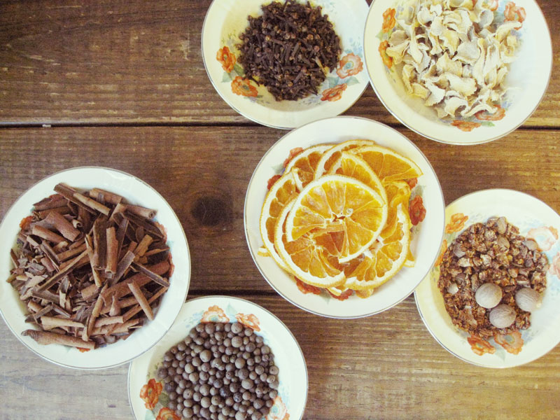 Assemble your ingredients: Cinnamon sticks, allspice berries, whole cloves, dried orange slices, dried ginger and nutmeg