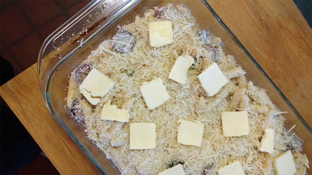 Butter and breadcrumbs before the oven